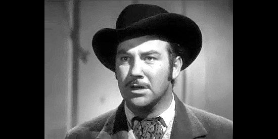 Broderick Crawford as Bob Holliday reacts to news that his girl has married his brother in Badlands of Dakota (1941)