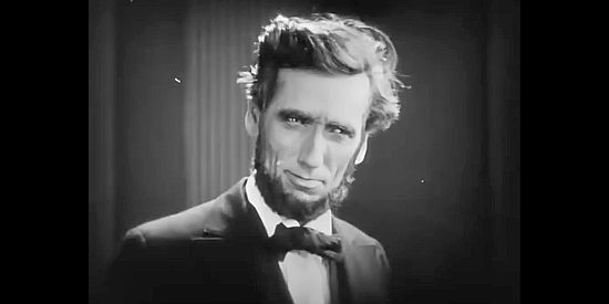 Charles Edward Bull as Abe Lincoln in The Iron Horse
