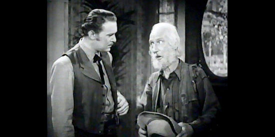 Clem Bevans (right) as Buffalo Burns informs Bat Masterson (Albert Dekker) of a planned ambush in The Woman of the Town (1943)