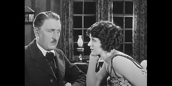 Cyril Chadwick as Jesson, trying to resist Ruby (Gladys Hulette) and her charm in The Iron Horse (1924)