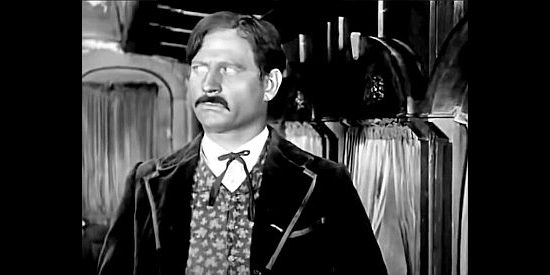 Fred Kohler as Deroux, a businessman determined to route the railroad his way in The Iron Horse (1924)