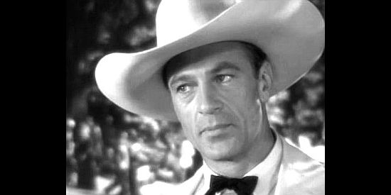 Gary Cooper as Clint Maroon, about to be embroiled in a railroad dispute in Saratoga Trunk (1945)