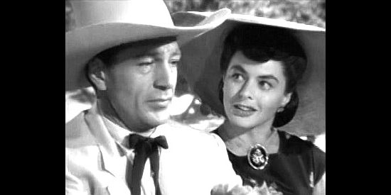 Gary Cooper as Clint Maroon and Ingrid Bergman as Clio Dulaine in Saratoga Trunk (1945)