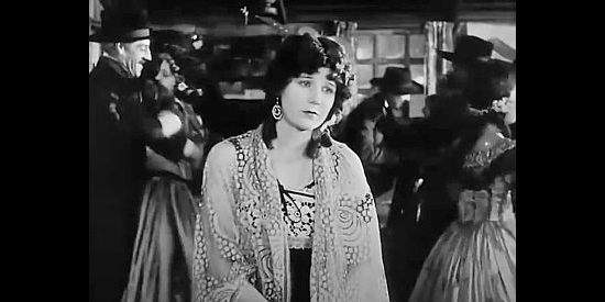 Gladys Hulette as Rudy, the saloon girl with a mischievous streak in The Iron Horse (1924)