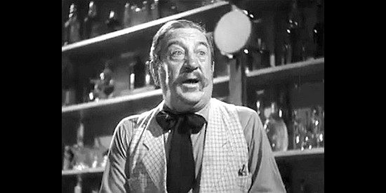 Hugh Herbert as bartender and chief fireman Rocky Plummer in Badlands of Dakota (1941)