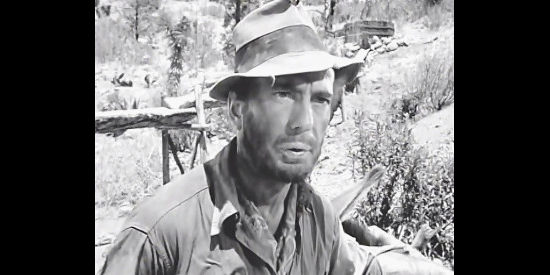 Humphrey Bogart as Fred C. Hobbs, wondering what will happen while he's off getting supplies in The Treasure of the Sierra Madre (1948)