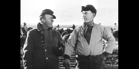 J. Farrell McDonald as Cpl. Casey with Francis Powwerrs as Sgt. Slattery in The Iron Horse (1924)