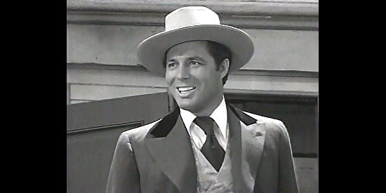 James Craig as Blackie Marshall, returning home for the first time in years in Northwest Rangers (1942)