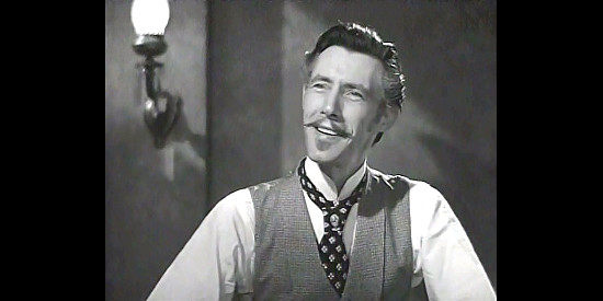 John Carradine as Martin Caswell, the gambler feuding with Blackie Marshall in Northwest Rangers (1942)