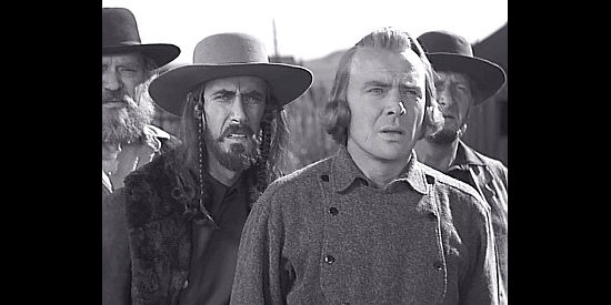 John Carradine as Porter Rockwell and Dean Jagger as Brigham Young watch a swarm of cricketts descend on the Mormons' crops in Brigham Young (1940)