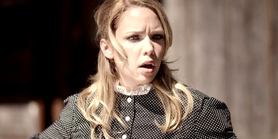Karin Brauns as Mrs. Stanton, accusing servant girl Hannah of sleeping with her husband in From Hell to the Wild West (2017).