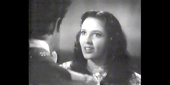 Linda Darnell as Lolita Quintero, realizing for the first time that Zorro and Don Diego are the same man in The Mark of Zorro (1940)