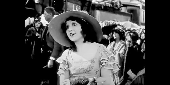 Madge Bellamy as Miriam Marsh, spotting a glimpse of Dave Brandon in The Iron Horse (1924)