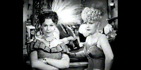 Marion Martin (right) as Daisy Davenport, jealous of Dora's effect on the guys in The Woman of the Town (1943)