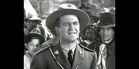 Patrick McVey as Sgt. Dugan, the Mountie who tries to keep Pierre in line in Pierre of the Plains (1942)