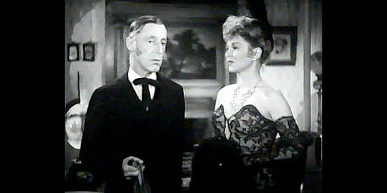 Percy Kilbirde as the Rev. Small, realizing his uptick in collections was partly due to the singing of saloon girl Dora (Claire Trevor) in The Woman of the Town (1943)