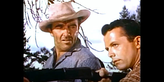 Preston Foster as Tom Eggers takes Danny Turner (Lon McCallister) hunting in The Big Cat (1949)