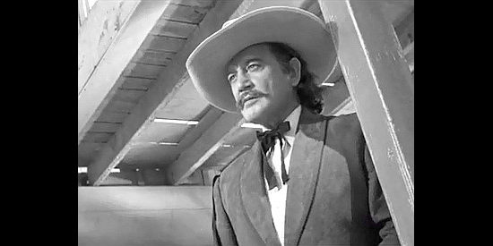 Richard Dix as Wild Bill Hickok, a man who doesn't want a badge but will help deal with trouble in Badlands of Dakota (1941)