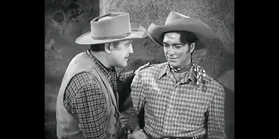 Richard Dix as Wyatt Earp showing support for Johnny Duane (Don Castle) in Tombstone, the Town Too Tough to Die (1942)