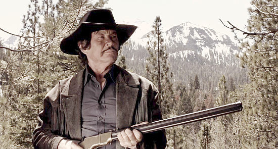 Robert (Bronzi) Kovacs as the man suspected of committing the killings in From Hell to the Wild West (2017).