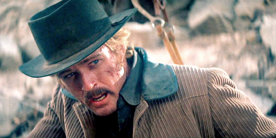 Robert Redford as The Sundance Kid, tired and on the run from a posse in Butch Cassidy and the Sundance Kid (1969) 