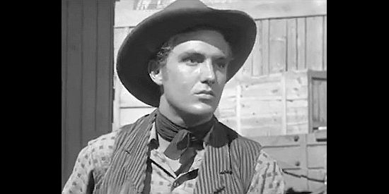 Robert Stack as Jim Holliday, the young man who finds himself wearing a sheriff's badge in Badlands of Dakota (1941)