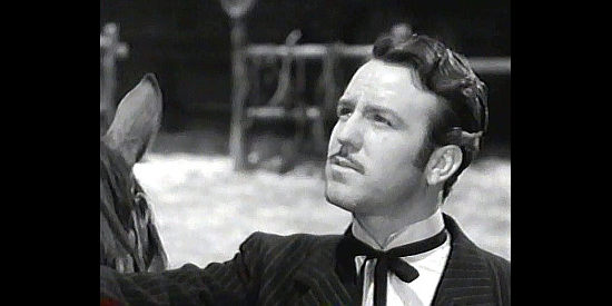 Steve Brodie as Logan Maury, the man driving the farmers off their land in Trail Street (1947)