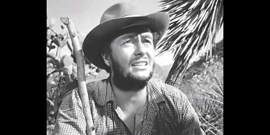 Tim Holt as Bob Curtin, enduring the grueling trip to the mountains in The Treasure of the Sierra Madre (1948)