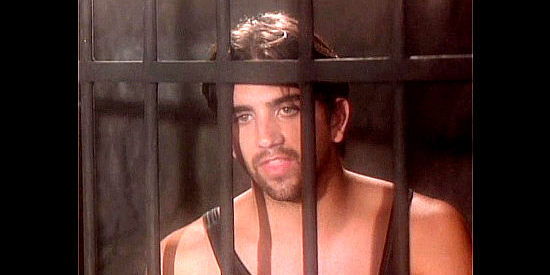 Troy Vincent as Steve Rogers, stuck in jail and about to learn frontier justice can be pleasurable in Petticoat Planet (1996)