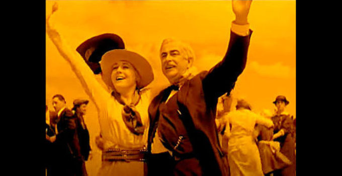 Vilma Banky as Barbara Worth and Charlie Lane as Jefferson Worth celebrate the opening of the dam in The Winning of Barbara Worth (1926)