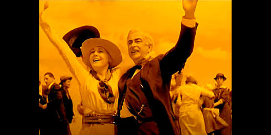 Vilma Banky as Barbara Worth and Charlie Lane as Jefferson Worth celebrate the opening of the dam in The Winning of Barbara Worth (1926)