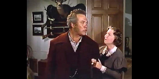 Ward Bond as Hoab Dabney, reacting to his daughter's plan to buy time while his wife (Sondra Rodgers) tries to calm him down in Tap Roots (1948)