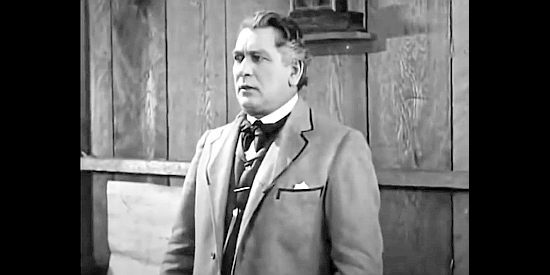 Will Walling as Thomas Marsh, looking for a shorter and cheaper route West in The Iron Horse (1924)