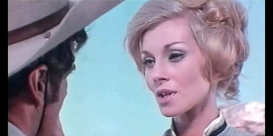 Eleonora Bianchi as Susan Wilson, unsure whether she can trust former bounty hunter Billy Walsh in Winchester Bill (1967)