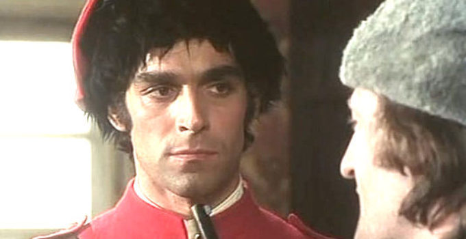 Fabio Testi as Cpl. Bill Cormack, in a bit of a jam with a gun at his throat in Cormack of the Mounties (1975)