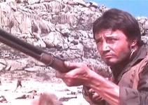 Hugo Blanco (John Clark) as Peter Lembrock, battling rebellion forces in Mestizo (1965)