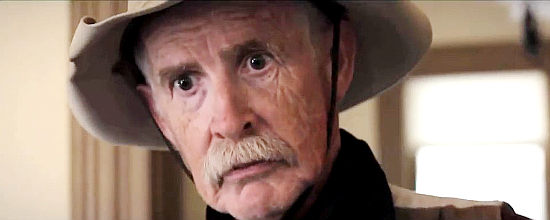 Mark Baugher as Dockie Barnett, an aging rancher with a child in trouble in C-Bar (2015)