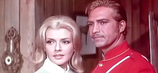 Susana Campos (Evelin Therens) as Helen Patterson with fiancee Corporal Lex (Gustavo Rojo) in Mestizo (1965)