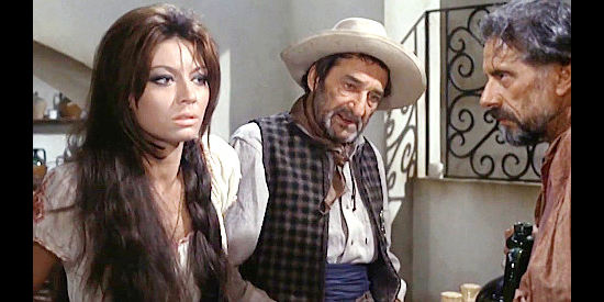 Alida Chelli as Juana, confessing to killing a man to a sheriff and bartender who seem unconcerned in Three Silver Dollars (1968)