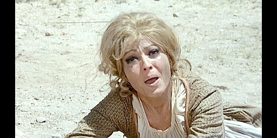 Dada Gallotti as Judith Garland, begging her husband to save his life by telling what he knows in Three Silver Dollars (1968)