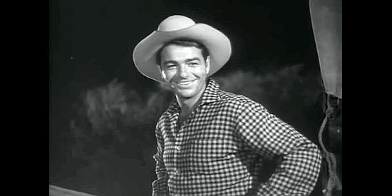Don Castle as Tim McCall, Mike's jovial younger brother in Stampede (1949)