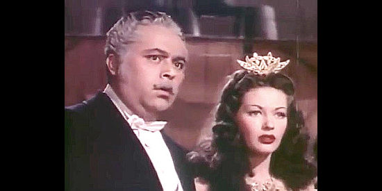 J. Edward Bromberg as Professor Max and Yvonne De Carlo as Salome, shocked at an interrupted performance in Salome Where She Danced (1945)