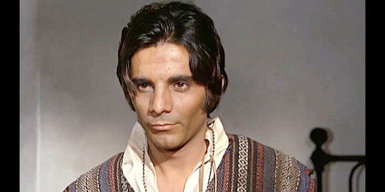 Julian Mateos as Hondo, the young Mexican who breaks out of jail with Burton, then joins his quest in Three Silver Dollars (1968)