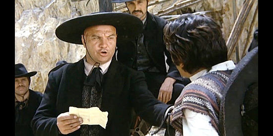 Pietro Ceccarelli as Cincaro, El Condor's lead henchman, questioning Hondo in Three Silver Dollars (1968)
