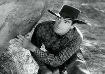 Rod Cameron as Mike McCall, trying to avoid being ambushed in Stampede (1949)