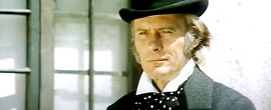 William Berger as John Warren, the American helping supply the rebels with weapons in Son of Zorro (1973)