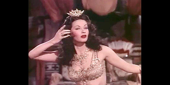 Yvonne De Carlo mesmerizes an audience with her dance moves in Salome Where She Danced (1945)