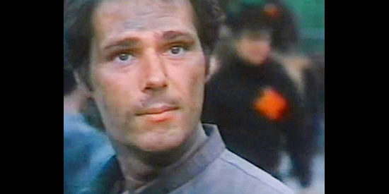 Allan Royal as Peter, one of the newcomers and new slaves in Welcome to Blood City (1977)