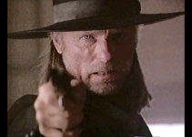 Ed Harris as Jim Lassiter, cleansing a house of God in Riders of the Purple Sage (1996)