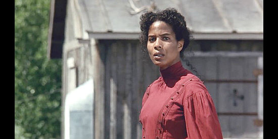 Janet Bailey as Mary Johnson, Britt's wife, one of the woman taken captive during an Indian raid in Black Fox (1995)